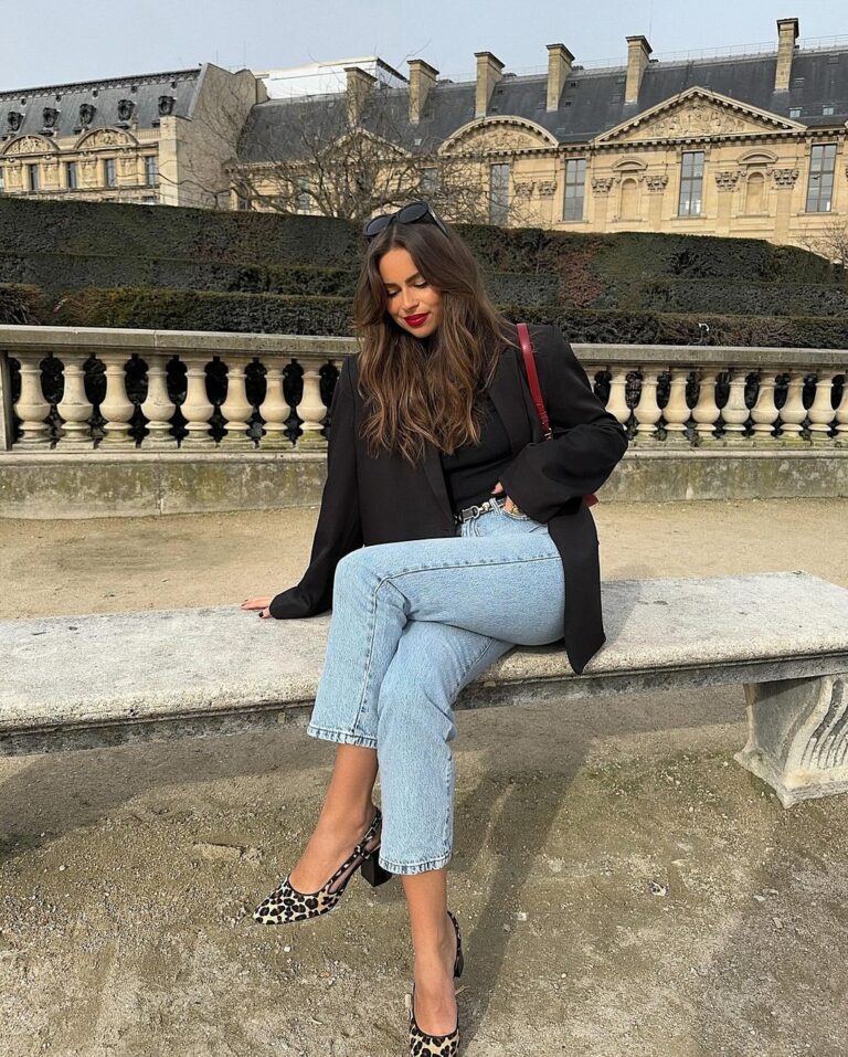 Chic fall outfit with black blazer, light blue jeans, and leopard print heels