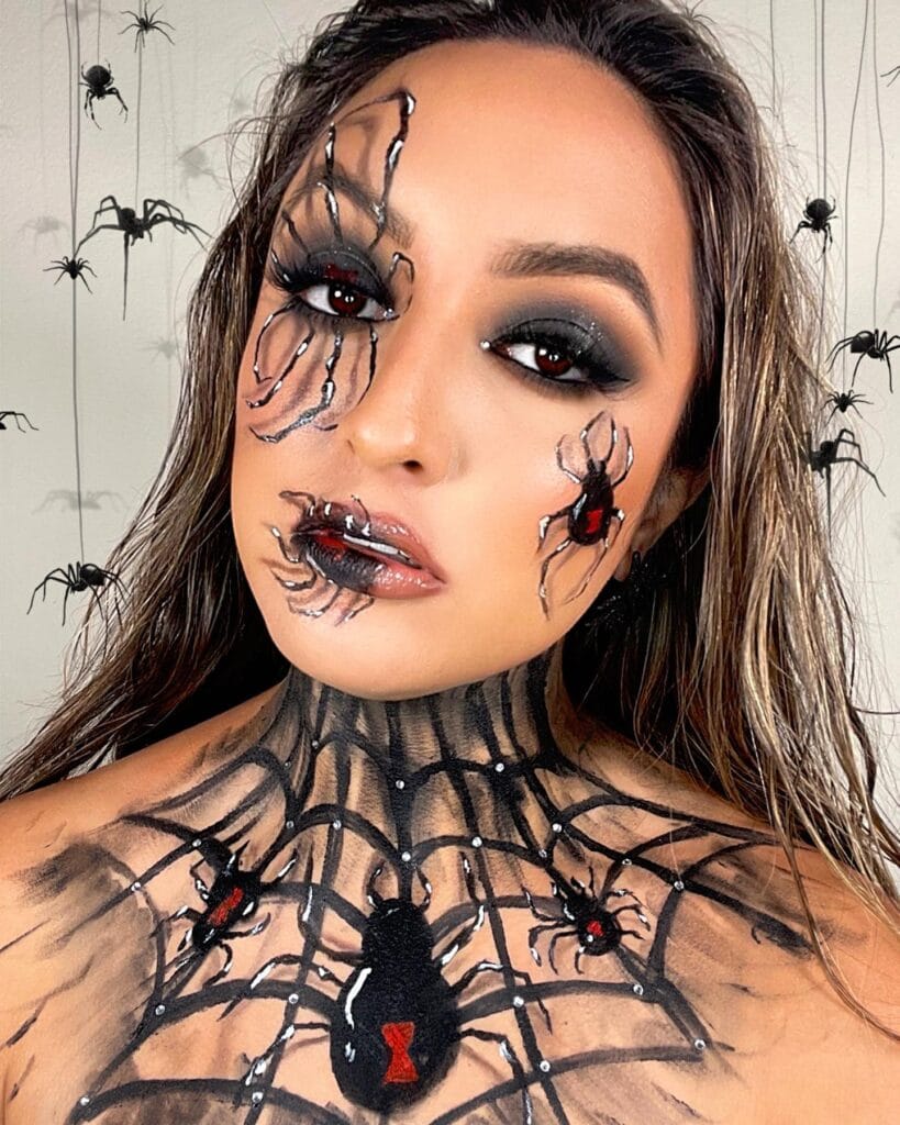 Halloween makeup featuring 3D spider webs and black widow spiders on face and neck.