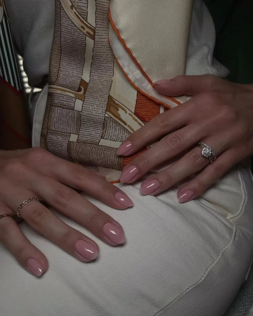 Old money nails in muted blush pink, paired with silk scarf, understated and elegant.