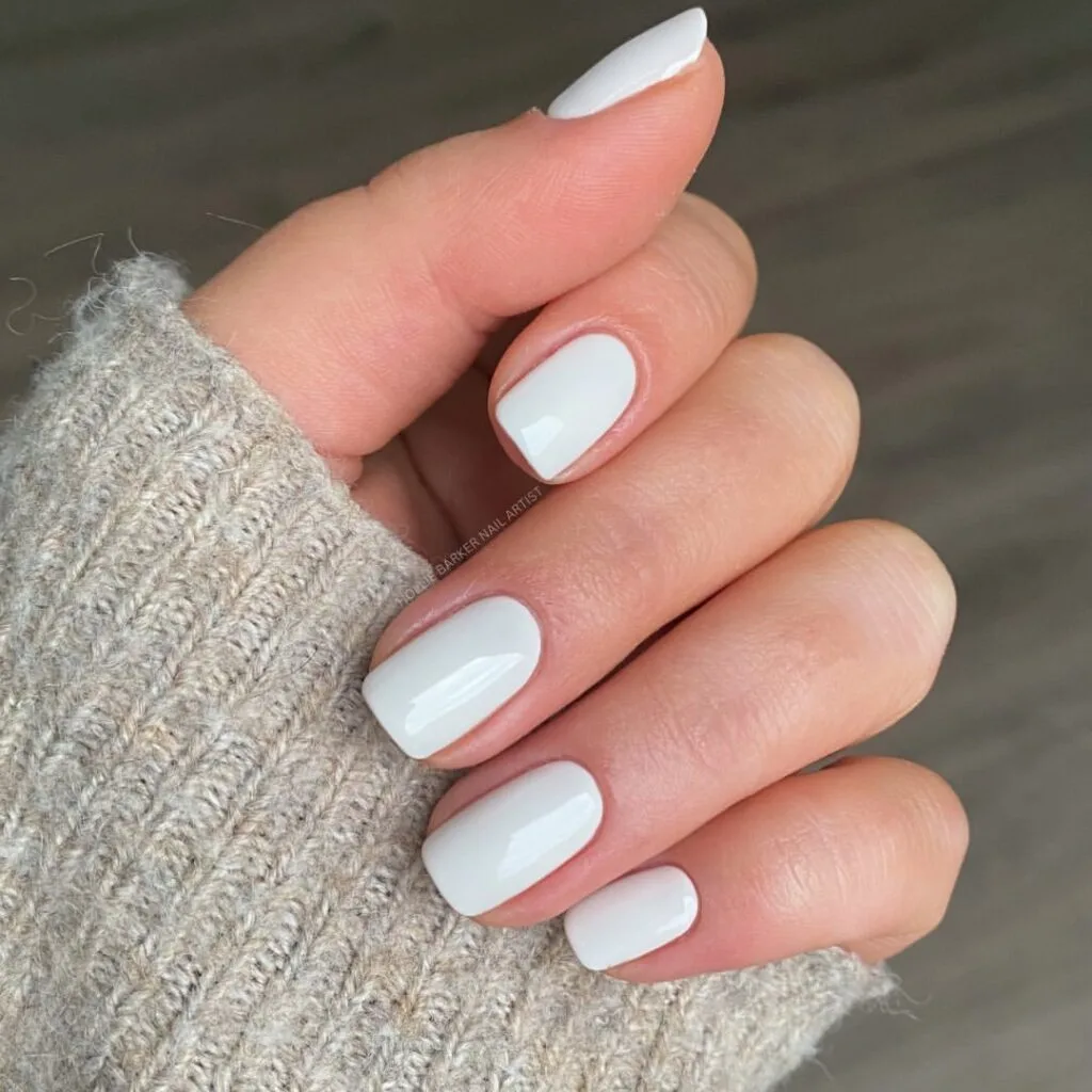 Creamy white old money nails, short and glossy, giving minimal luxury vibes.